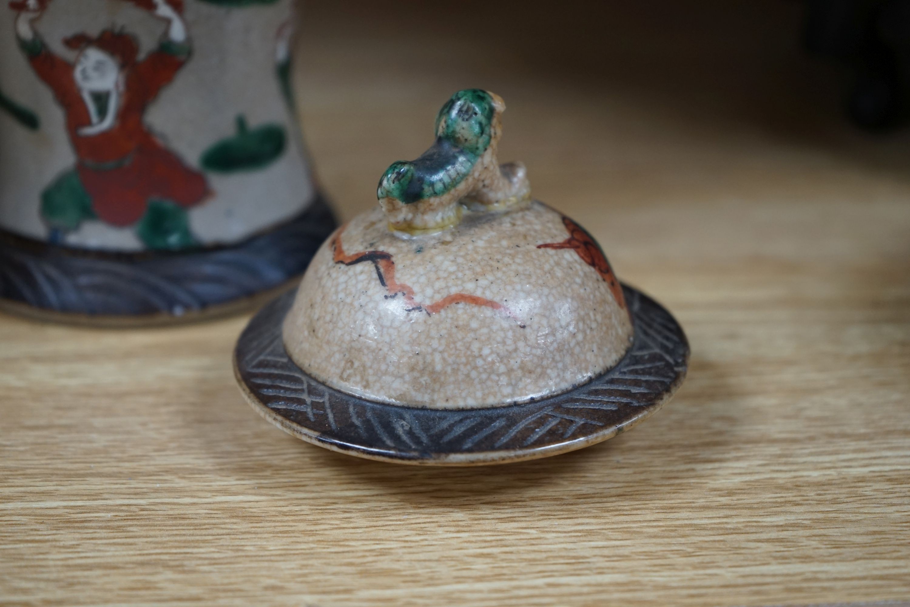 A late 19th century Chinese crackle glaze famille rose baluster vase and cover 30cm